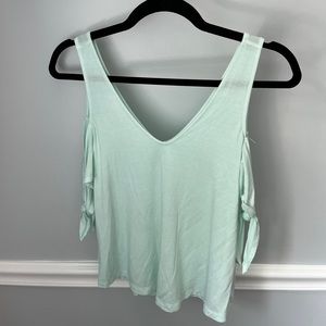 mint green open shoulder shirt 💚